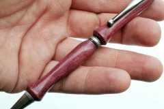 Purple Heart pen turned by Mike Feeney.
